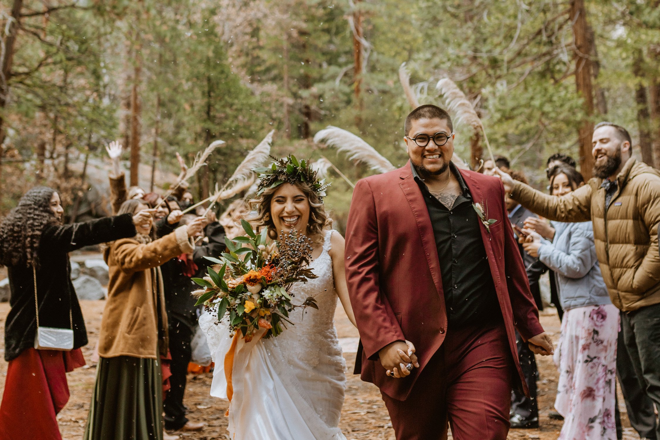 Bride and groom laughing at their Yosemite National Park wedding.